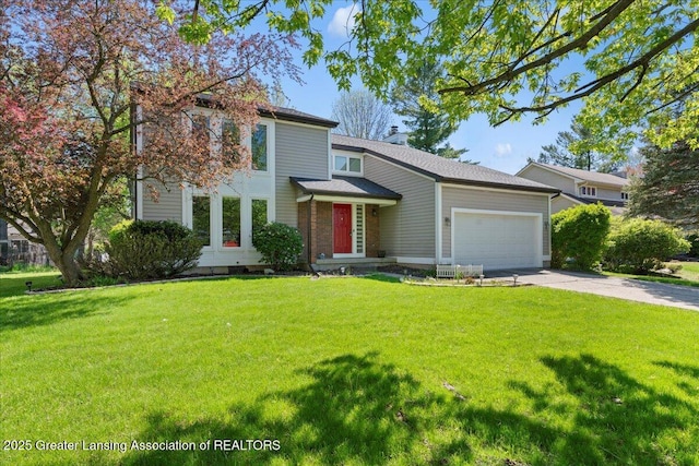 1263 Leeward Dr, Okemos, MI 48864 - view of front facade featuring a garage, driveway, a front yard, and a chimney
