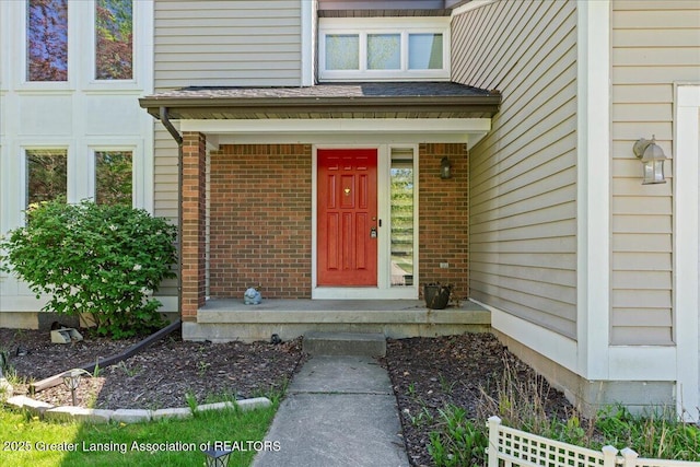 1263 Leeward Dr, Okemos, MI 48864 - property entrance featuring brick siding