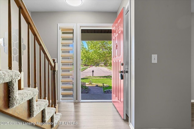 1263 Leeward Dr, Okemos, MI 48864 - entrance foyer with stairs and wood finished floors