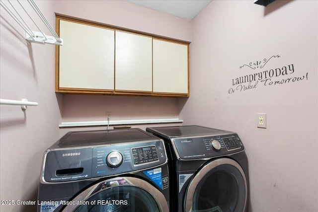 1263 Leeward Dr, Okemos, MI 48864 - laundry area with cabinet space and washing machine and clothes dryer