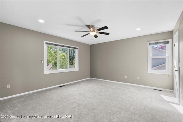 1263 Leeward Dr, Okemos, MI 48864 - empty room with ceiling fan, carpet floors, baseboards, and recessed lighting
