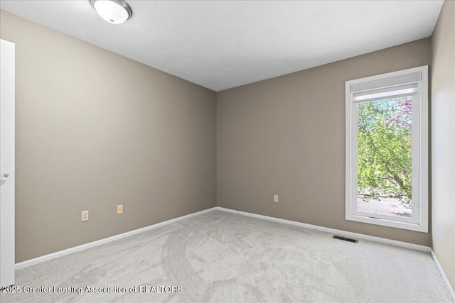1263 Leeward Dr, Okemos, MI 48864 - unfurnished room with carpet flooring and baseboards