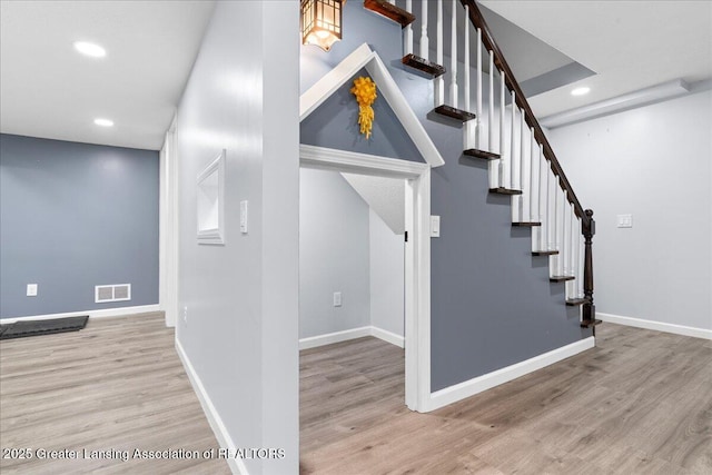 1263 Leeward Dr, Okemos, MI 48864 - stairs with wood finished floors, recessed lighting, and baseboards