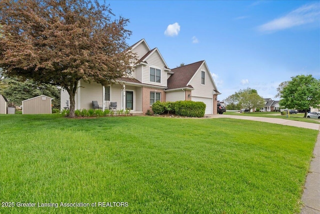13503 Cottonwood Ct, Dewitt, MI 48820 - view of front of home with a garage, a front lawn, concrete driveway, and a porch