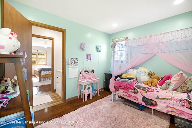 2335 N Concord Rd, Albion, MI 49224 - bedroom featuring wood finished floors, recessed lighting, and baseboards