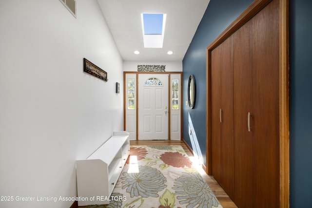2335 N Concord Rd, Albion, MI 49224 - doorway with light wood-style floors, recessed lighting, and baseboards