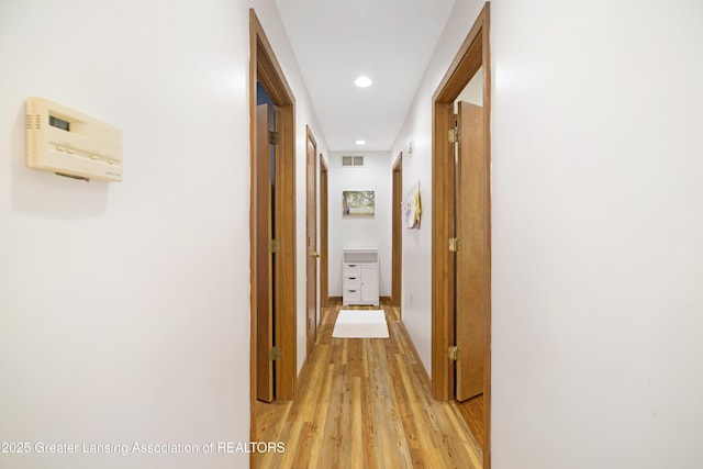 2335 N Concord Rd, Albion, MI 49224 - hall featuring light wood finished floors and recessed lighting