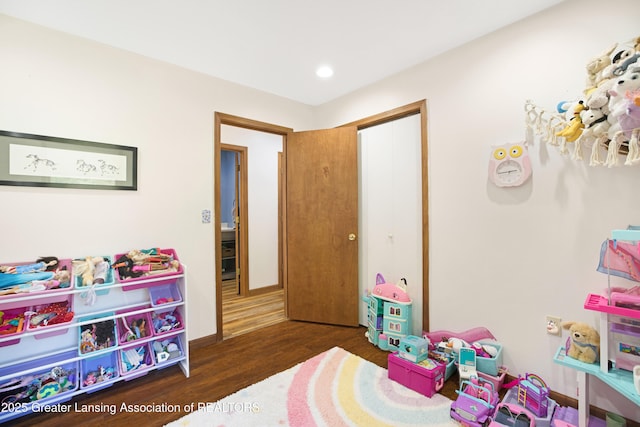 2335 N Concord Rd, Albion, MI 49224 - recreation room with wood finished floors, recessed lighting, and baseboards