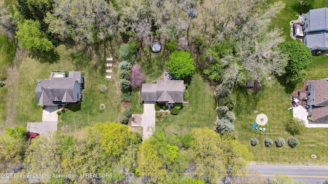 aerial view of property's location with nearby suburban area