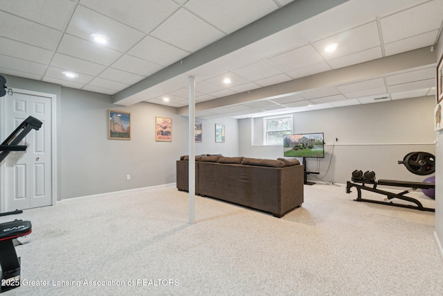 exercise area featuring carpet, a paneled ceiling, recessed lighting, and baseboards
