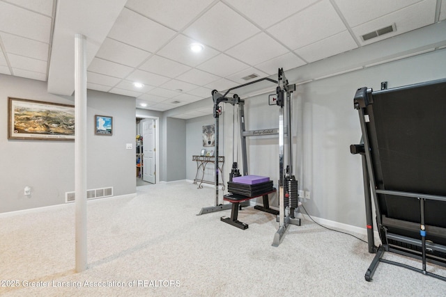 workout room with carpet, a paneled ceiling, baseboards, and recessed lighting