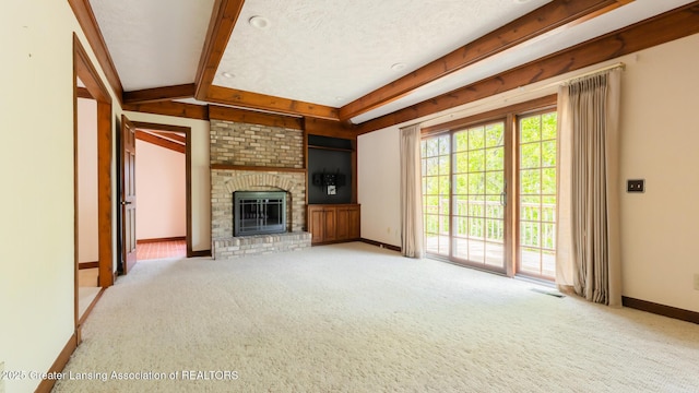 4245 Sandridge Dr, Okemos, MI 48864 - unfurnished living room with baseboards, carpet floors, a brick fireplace, and beamed ceiling