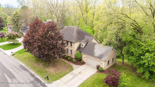 4245 Sandridge Dr, Okemos, MI 48864 - view of subject property featuring a forest