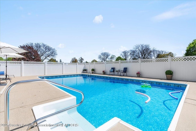 1801 Tahyio Rd, Owosso, MI 48867 - view of pool with a fenced backyard and a patio
