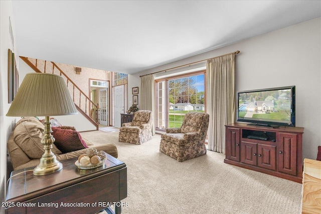 1801 Tahyio Rd, Owosso, MI 48867 - carpeted living area featuring stairway