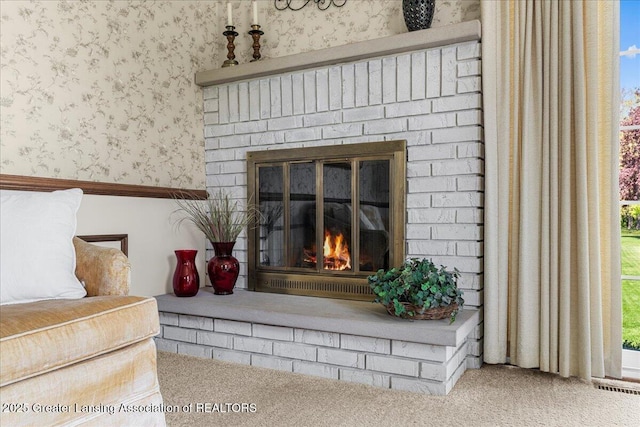 1801 Tahyio Rd, Owosso, MI 48867 - detailed view of a fireplace, carpet, and wallpapered walls