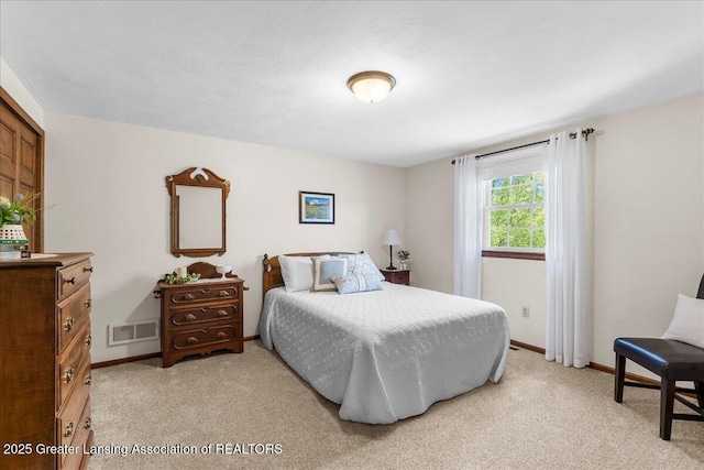 1801 Tahyio Rd, Owosso, MI 48867 - bedroom with light colored carpet and baseboards
