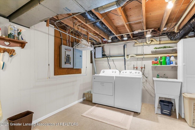 1801 Tahyio Rd, Owosso, MI 48867 - clothes washing area with separate washer and dryer and electric panel