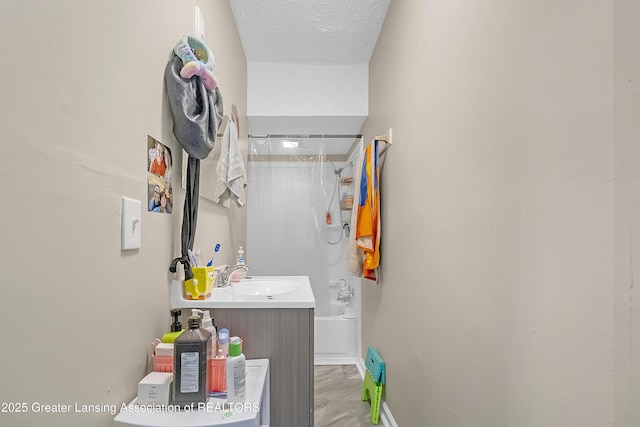 114 Haze St, Lansing, MI 48917 - bathroom with shower / bath combination with curtain, vanity, and marble finish flooring