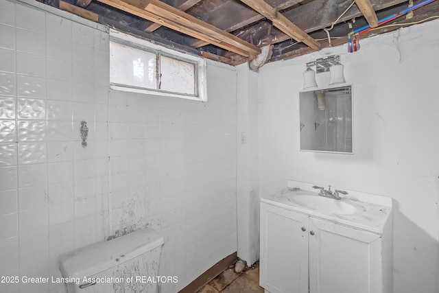 114 Haze St, Lansing, MI 48917 - bathroom with vanity and toilet