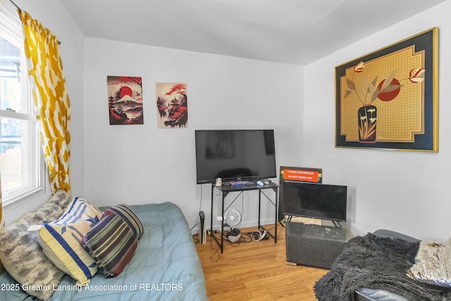 922 Dakin St, Lansing, MI 48912 - living room with wood finished floors and healthy amount of natural light