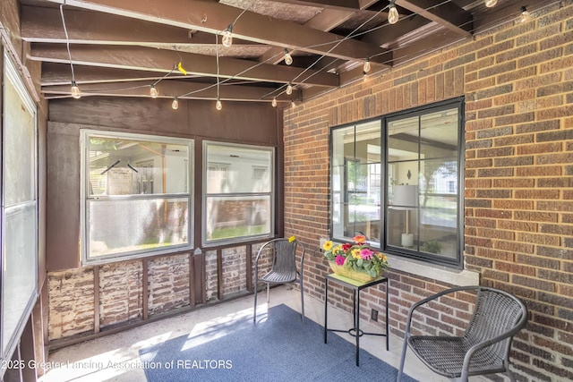 514 W St, Lansing, MI 48915 - sunroom featuring plenty of natural light and beam ceiling
