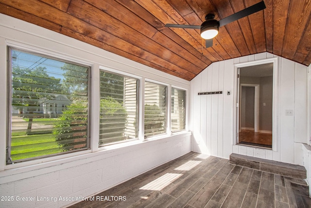 2119 Grant St, Lansing, MI 48910 - unfurnished sunroom featuring vaulted ceiling, wooden ceiling, a ceiling fan, healthy amount of natural light, and wood walls