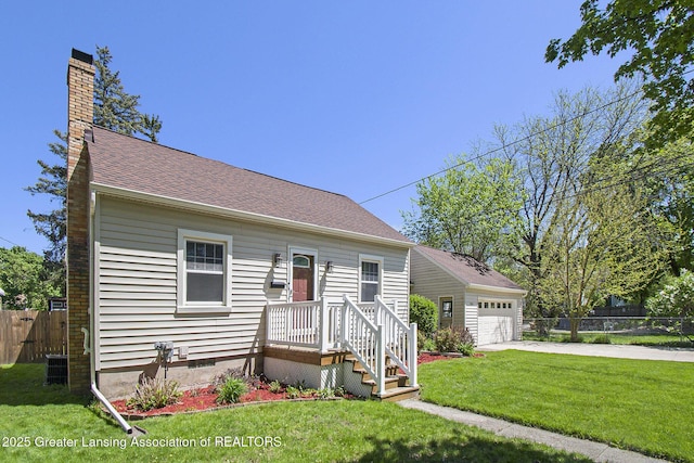 2119 Grant St, Lansing, MI 48910 - view of front facade with concrete driveway, a chimney, a garage, and roof with shingles