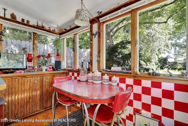 411 Jackson St, Grand Ledge, MI 48837 - dining space featuring wood finished floors