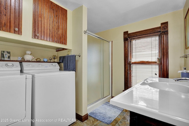 411 Jackson St, Grand Ledge, MI 48837 - laundry room featuring independent washer and dryer and baseboards