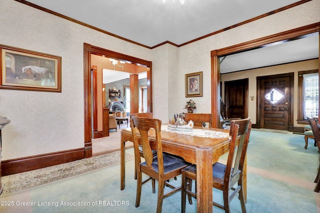 411 Jackson St, Grand Ledge, MI 48837 - dining room featuring light colored carpet and crown molding