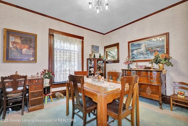 411 Jackson St, Grand Ledge, MI 48837 - dining space with carpet flooring, a chandelier, crown molding, and a textured wall