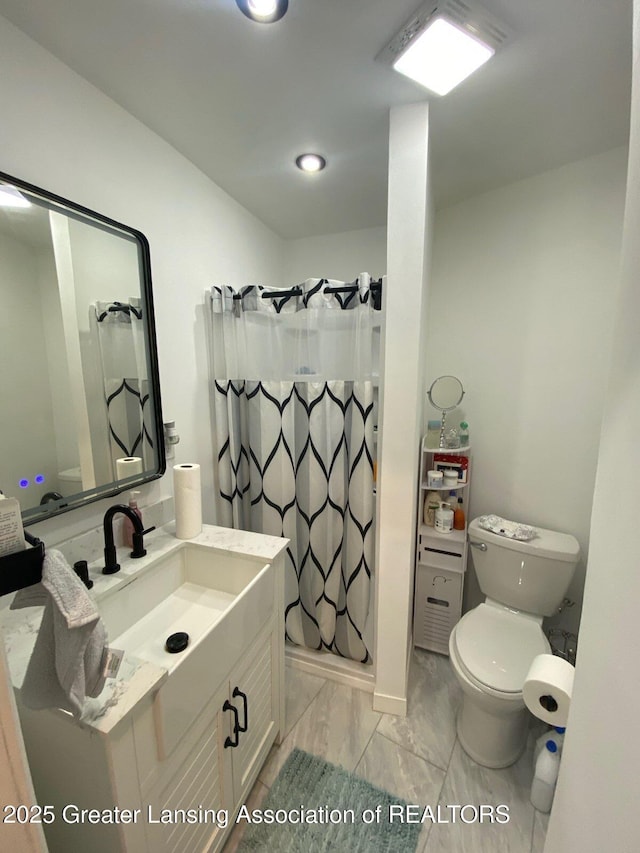 11500 Eden Trl, Eagle, MI 48822 - bathroom with toilet, marble finish flooring, a shower with curtain, and vanity