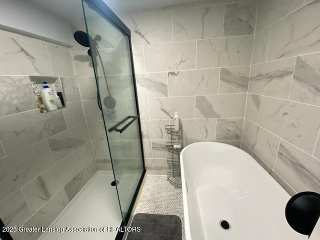 11500 Eden Trl, Eagle, MI 48822 - full bath with a freestanding tub and a stall shower