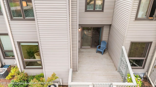1455 Lakeside Dr, East Lansing, MI 48823 - view of exterior entry with central AC unit