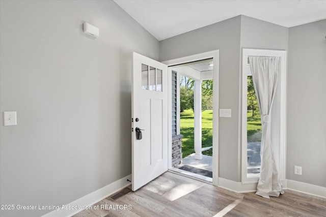 15426 S Lowell Rd, Lansing, MI 48906 - entrance foyer with wood finished floors and baseboards