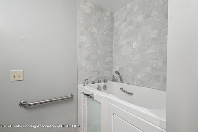 15426 S Lowell Rd, Lansing, MI 48906 - full bathroom with a tub to relax in