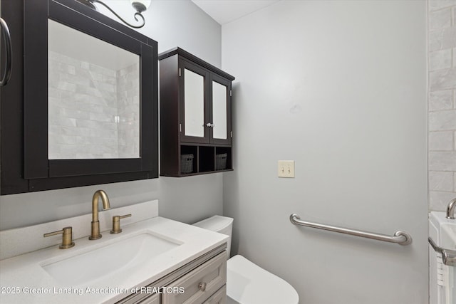 15426 S Lowell Rd, Lansing, MI 48906 - full bathroom with vanity and toilet