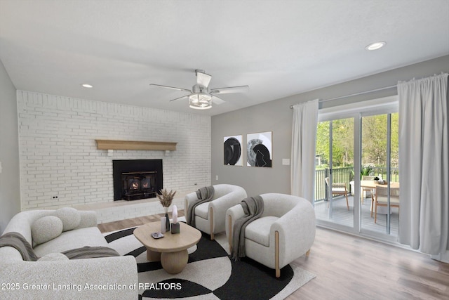 15426 S Lowell Rd, Lansing, MI 48906 - living area featuring a ceiling fan, light wood-style floors, and recessed lighting