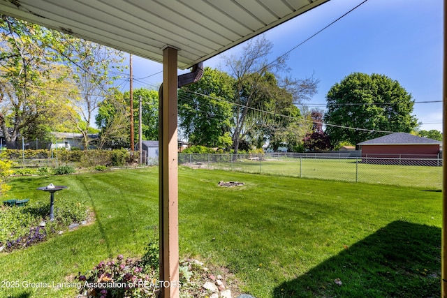 3316 Pickwick Pl, Lansing, MI 48917 - view of yard with a shed and an outdoor structure