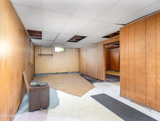 3316 Pickwick Pl, Lansing, MI 48917 - below grade area with wood walls and a paneled ceiling