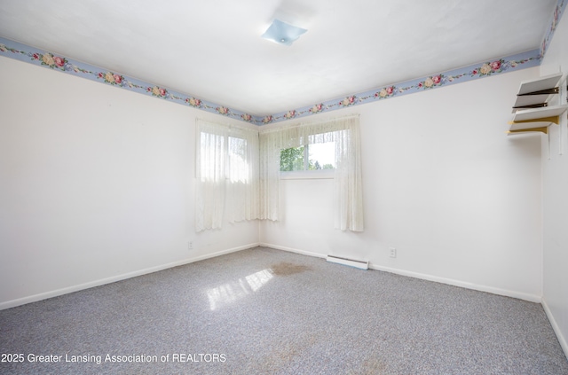 3316 Pickwick Pl, Lansing, MI 48917 - unfurnished room featuring carpet floors and baseboards