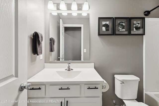 1123 Chesham Ln, Grand Ledge, MI 48837 - bathroom featuring vanity and toilet
