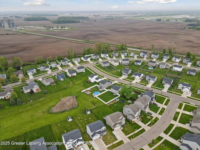 1123 Chesham Ln, Grand Ledge, MI 48837 - aerial overview of property's location featuring nearby suburban area and rural landscape