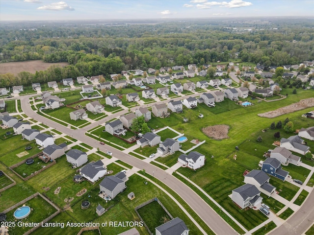 1123 Chesham Ln, Grand Ledge, MI 48837 - aerial view of property and surrounding area featuring nearby suburban area