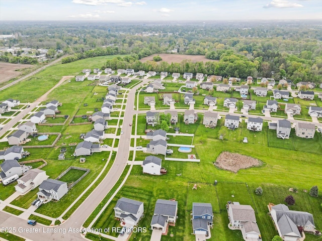 1123 Chesham Ln, Grand Ledge, MI 48837 - aerial view of property and surrounding area featuring nearby suburban area