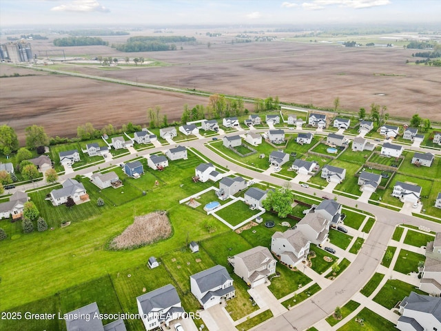 1123 Chesham Ln, Grand Ledge, MI 48837 - aerial overview of property's location featuring nearby suburban area and rural landscape