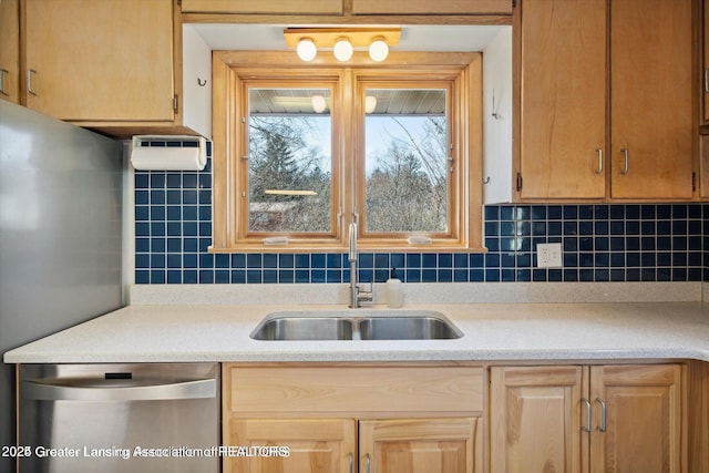 4794 Ardmore Ave, Okemos, MI 48864 - kitchen with dishwasher, a sink, light countertops, and decorative backsplash
