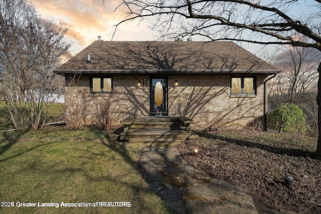 4794 Ardmore Ave, Okemos, MI 48864 - view of front facade with a shingled roof