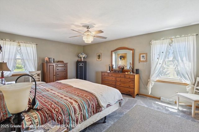 12898 Walker Rd, Leslie, MI 49251 - bedroom featuring carpet, ceiling fan, and baseboards